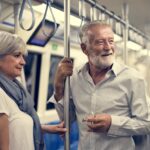 Senior couple traveling inside train subway_rawpixel.com_freepik