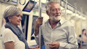 Senior couple traveling inside train subway_rawpixel.com_freepik